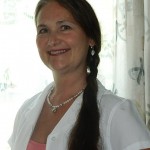 Smiling woman with long braided hair
