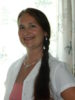 Smiling woman with long braided hair